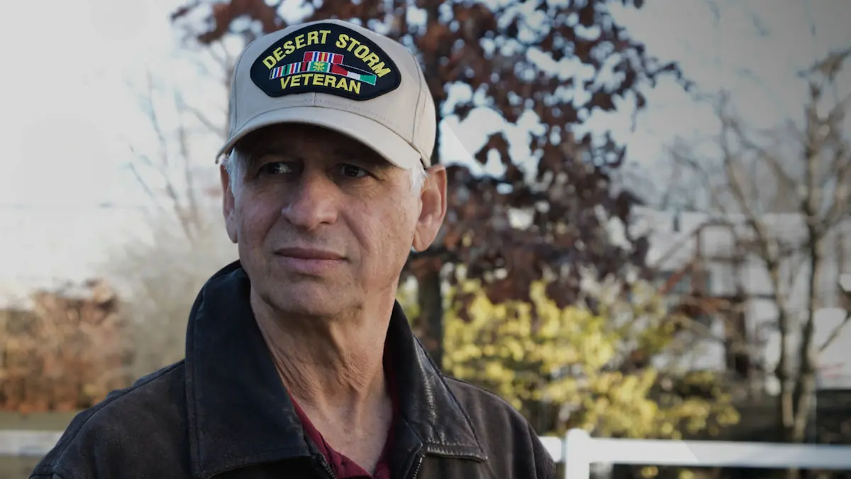 Veteran staring past the camera.